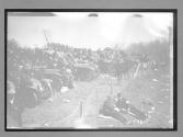 [spectators' autos parked at race]