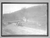 [auto racing on country road "#12"]