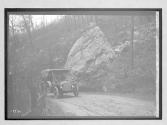 [auto on country road by bolder "Premier"]