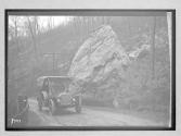 [auto on country road by bolder "Premier"]