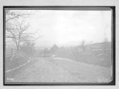 [auto driving on country road]