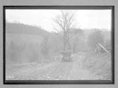 [auto driving on country road]