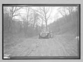 [auto driving on countyr road "Premier"]