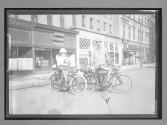 [two motorcyclists]