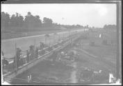 [autos racing at track]
