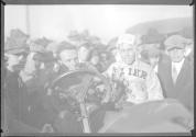 [close-up of racer with spectators]