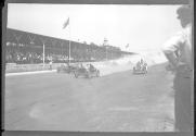 [autos racing at track]