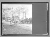[auto and horse & wagon on country road]