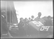 [auto racer in auto "#54"]