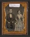 [Seated man and woman]