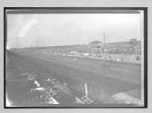 [autos racing at track "#44, #50]
