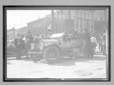 [auto tourist in town with spectators "#49"]