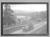 [auto driving on country road along river "NY38773"]