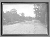 [auto driving on country road]
