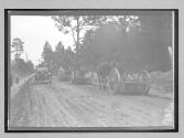 [prison laborers working on country road]