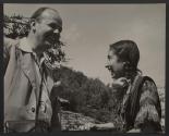 [Portrait of a man and woman laughing]