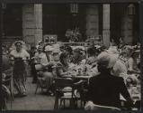 [Crowded restaurant interior]
