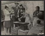 [Mr. C.C. Ramert and family tasting their first tortillas in Mexico]