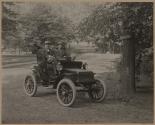 [Thomas Edison and William Bee in Detroit Electric automobile on Edge Hill Avenue in Llewellyn Park, West Orange, New Jersey]