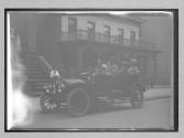 [auto stopped in front of the "St Thomas Academy", "NY38773"]