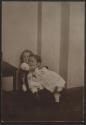 [Two children]