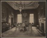 [Interior of room with table and fireplace]