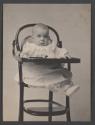 [Baby in high chair]
