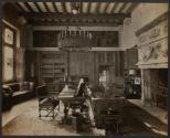 [Interior with fireplace and chandelier, Harbor Hill, Long Island]