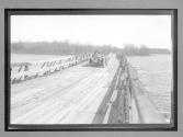 Crossing the Wooden Bridge over Cheve River to St Benoit