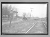 [auto crossing railroad track "Shawnee & Water Gap" on sign]