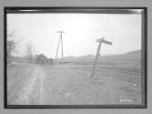[auto crossing railroad track "Shawnee & Water Gap" on sign]