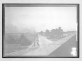 [view of country road from bridge]