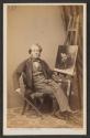 [William Powell Frith seated at easel]