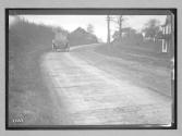 [auto tour driving down country road "Premier"]