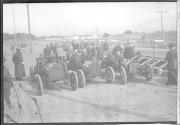 [autos lined up at track "#33, #34, #35"]