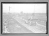 [auto tour driving on country road]