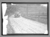 [auto driving on country road]