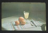 [Three oranges and a glass of juice]
