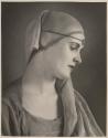 [Woman in headdress]