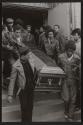[People attending funeral for those who died at The Attica prison in New York]
