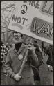 [Man wearing glasses with peace signs on them at Peace Parade, New York City]
