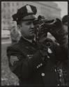 [Police officer photographing demonstrators for intelligence during a march at the White House, Washington DC]
