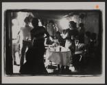 [People socializing and partying at the GAA Firehouse]

