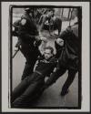 [Man being dragged by police during the Act Up protest]
