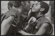 [Two men kissing at Yayoi Kusama's Brooklyn Bridge Meatgrinder performance, New York, New York]
