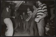 [Men dancing at the GAA Firehouse]
