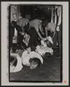 [Several people being arressted by police officers during Act-Up protests]
