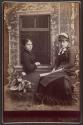 [Olive Ann Jacques Caldwell and woman wearing hat]