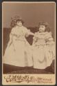 [Two dolls]