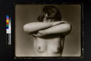 [Upper body Nude, folded arms covering nose and mouth]